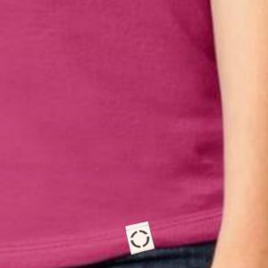 Ladies Pink One shirt with woven label close up.