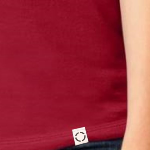 Ladies Red One shirt with woven label close up.