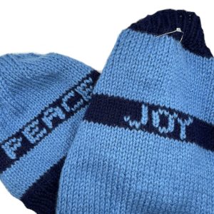 Pieces of Joy assorted pet sweaters and beanie combos.