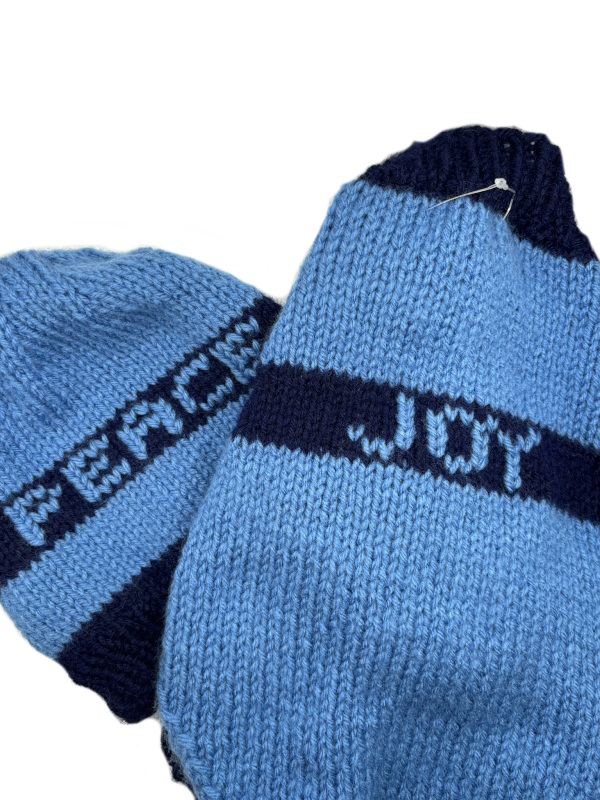 Pieces of Joy assorted pet sweaters and beanie combos.